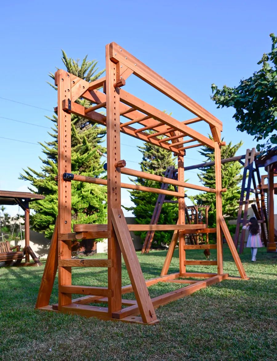 Custom Sheldon's Monkey Bars (Options: 8 ft H, 108.5 ft L, Douglas-fir, Standard Step Option, Transparent Premium Sealant) with Balance Beam and Parallel Bars. Extra Supports Added at the Bottom of the Monkey Bar. Balance Beam Can be Removed and Used Independently.