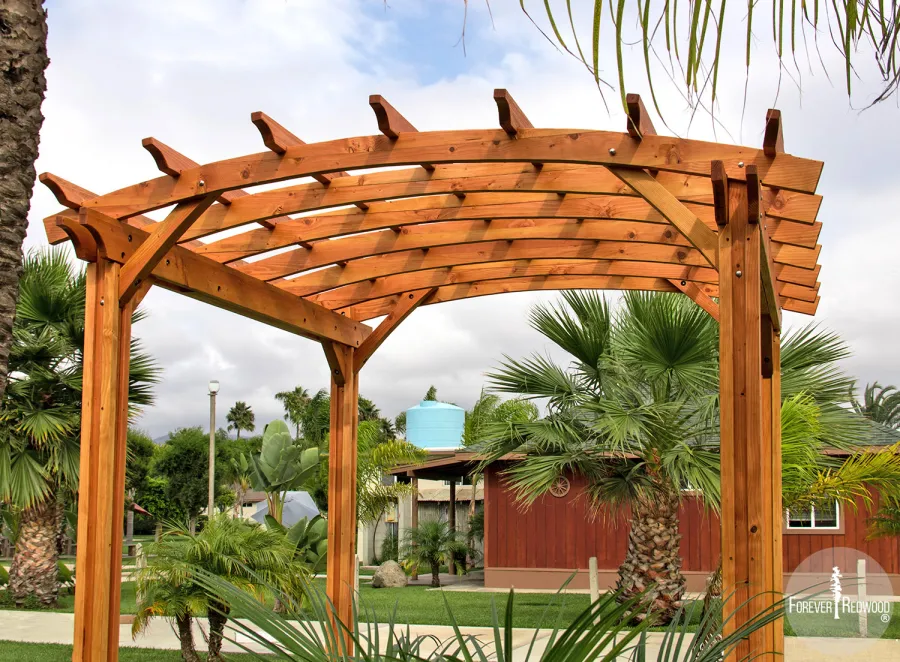Small Arched Open Sky Pergolas (Options: 10' L x 10' W, No Privacy Panels, Douglas-Fir, No Rain Guard, 9 ft Post Height, No Electrical Wiring Trim, Vertical Decorative Trim, 4-Post Anchor Kit for Concrete, No Curtain Rods, No Retractable Shade Canopy, Transparent Premium Sealant).