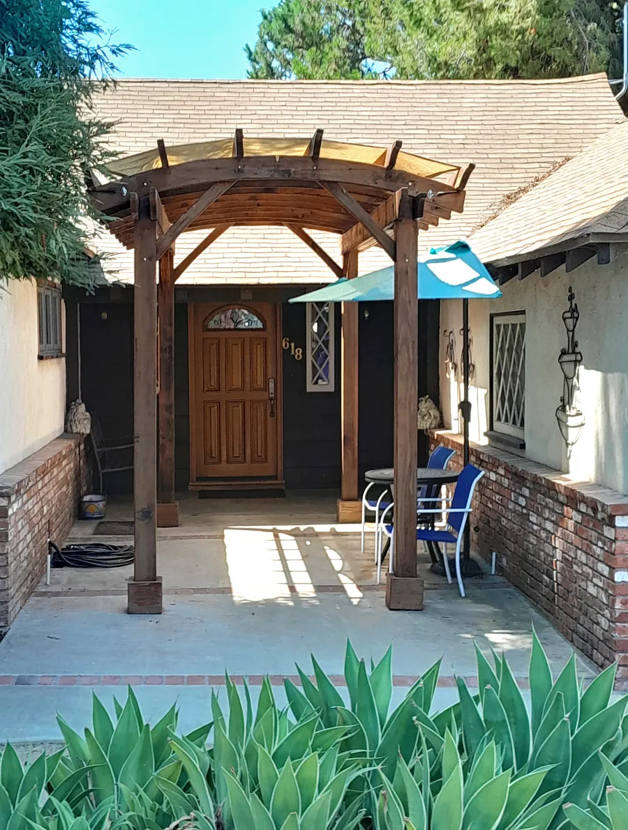 Small Arched Open Sky Pergolas (Options: 15' L x 8' W, No Privacy Panels, Mature Redwood, No Rain Guard, 8.5 ft Post Height, No Electrical Wiring Trim, No Post Decorative Trim, 4-Post Anchor Kit for Concrete, No Curtain Rods, No Retractable Shade Canopy, Transparent Premium Sealant). Photo Taken 11 Years After Installation. Photo Courtesy of B. McCusker of Glendora, CA.