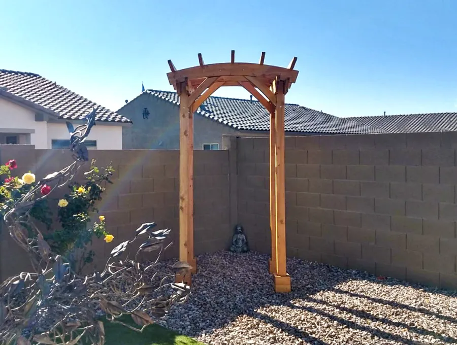 Small Arched Open Sky Pergolas (Options: 5' L x 5' W, No Privacy Panels, Mature Redwood, No Rain Guard, 8.5 ft Post Height, No Electrical Wiring Trim, No Post Decorative Trim, 4-Post Anchor Kit for Concrete, No Curtain Rods, No Retractable Shade Canopy, Transparent Premium Sealant). Photo Courtesy of M. Hall of Peoria, Arizona.