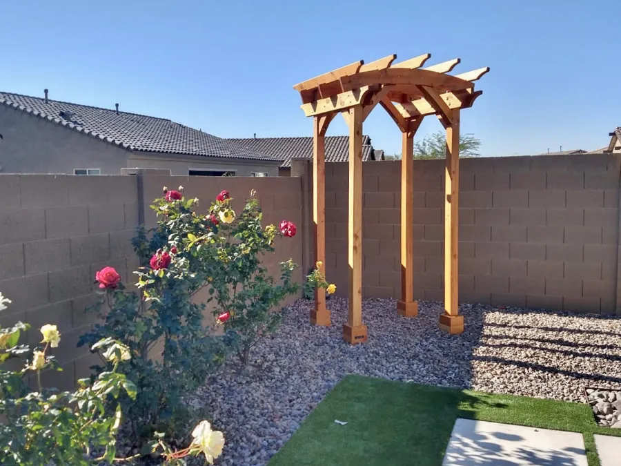 Small Arched Open Sky Pergolas (Options: 5' L x 5' W, No Privacy Panels, Mature Redwood, No Rain Guard, 8.5 ft Post Height, No Electrical Wiring Trim, No Post Decorative Trim, 4-Post Anchor Kit for Concrete, No Curtain Rods, No Retractable Shade Canopy, Transparent Premium Sealant). Photo Courtesy of M. Hall of Peoria, Arizona.