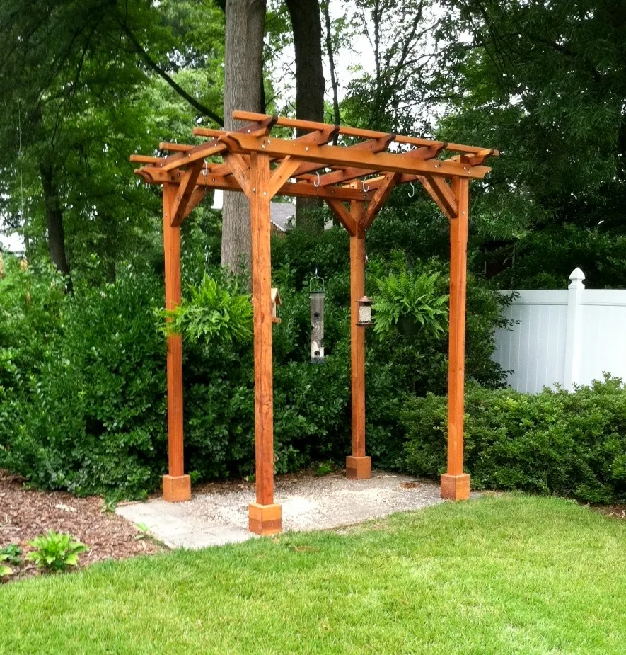Small Garden Pergola Kit (Options: 8' L x 6' W, No Privacy Panels, California Redwood, 9 ft Post Height, 4-Post Anchor Kit for Stone, No Curtain Rods, No Decorative Trims, Transparent Premium Sealant). Photo Courtesy of James C. of Alexandria VA.