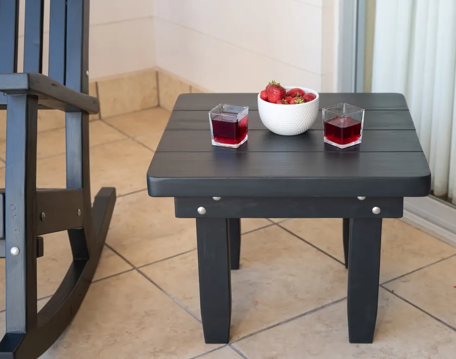 Square Side Table (Options: 23" Size, Mature Redwood, Rounded Corners, 18" H, Black Stain Premium Sealant) with a Massive Rocking Bench.