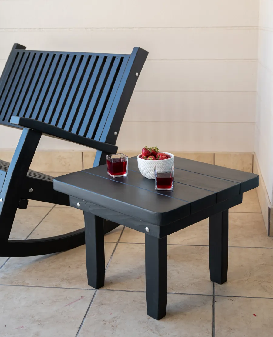 Square Side Table (Options: 23" Size, Mature Redwood, Rounded Corners, 18" H, Black Stain Premium Sealant) with a Massive Rocking Bench.