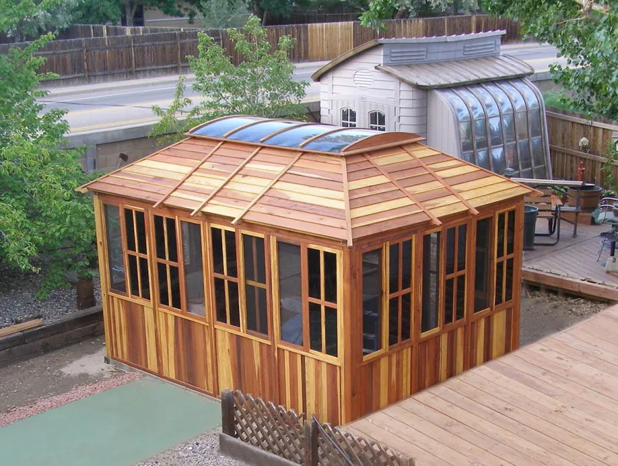 Spa Gazebo Kit (Options: 10' L, 14' W, California Redwood, All Sliding Windows with Screens, 4' x 6' Skylight, 36" H Siding Below Windows, Vertical Siding, Japanese Doors with Screens, No Flooring, Transparent Premium Sealant). Photo Courtesy of Richard S. of Loveland, Colorado.