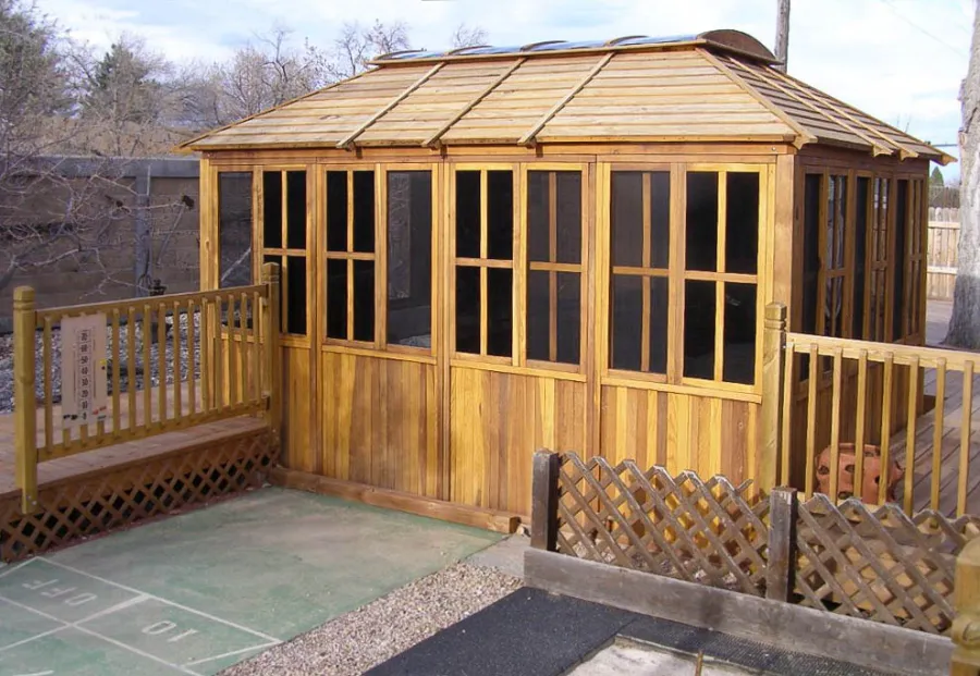 Spa Gazebo Kit (Options: 10' L, 14' W, California Redwood, All Sliding Windows with Screens, 4' x 6' Skylight, 36" H Siding Below Windows, Vertical Siding, Japanese Doors with Screens, No Flooring, Transparent Premium Sealant). Photo Courtesy of Richard S. of Loveland, Colorado.