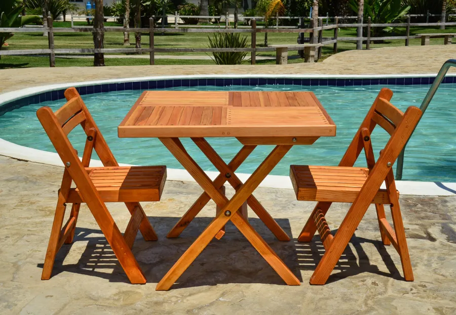 Square Wooden Folding Table (Options: 2 Folding Chairs, Douglas-fir, No Cushions, Standard Tabletop, Checkerboard Design, Rounded Corners, No Umbrella Hole, Transparent Premium Sealant). Photo Courtesy of El Laurel, Ensenada, Mexico.