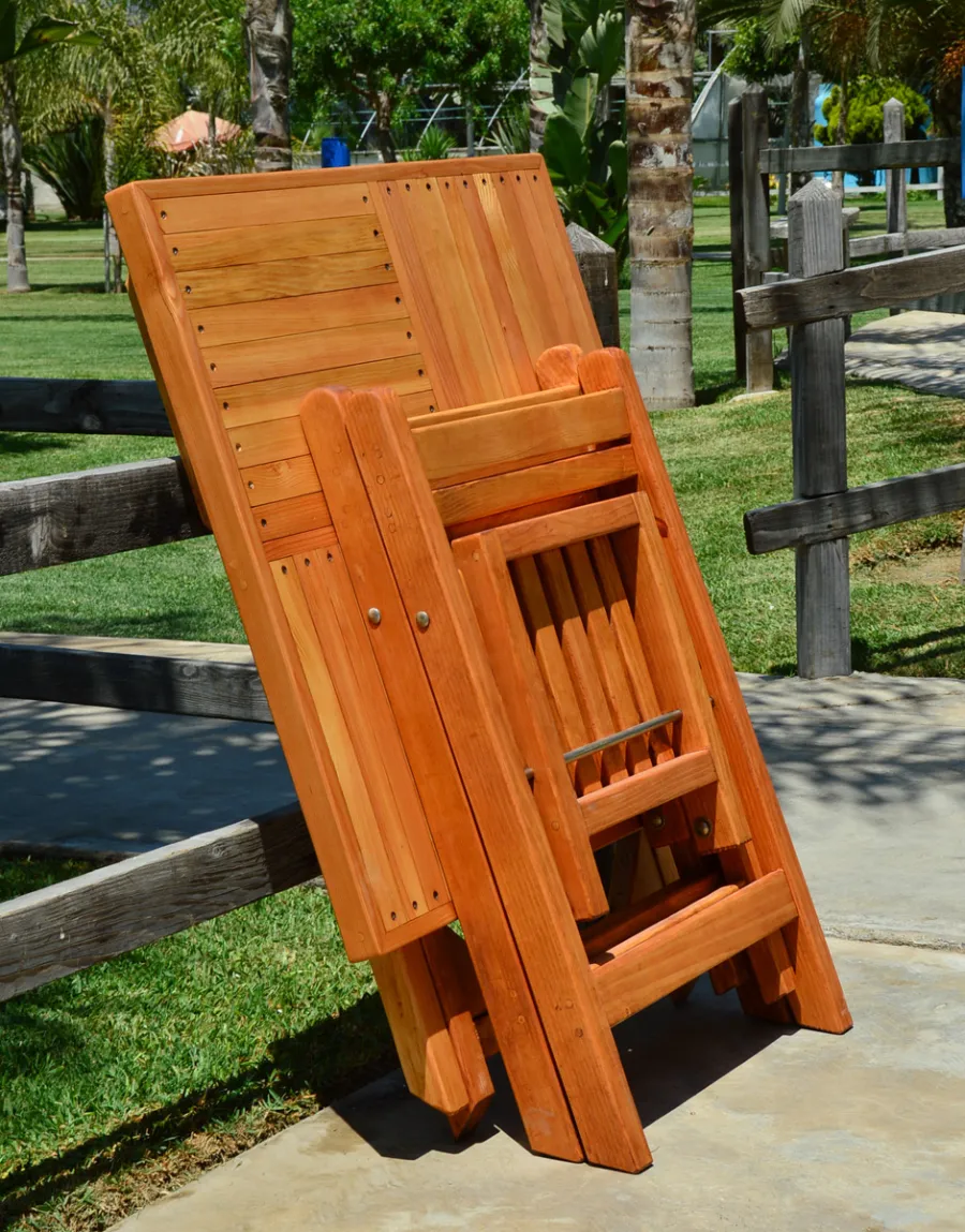 Square Wooden Folding Table (Options: 2 Folding Chairs, Douglas-fir, No Cushions, Standard Tabletop, Checkerboard Design, Rounded Corners, No Umbrella Hole, Transparent Premium Sealant). Photo Courtesy of El Laurel, Ensenada, Mexico.