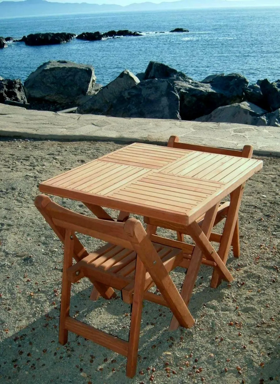 Square Wooden Folding Table (Options: 2 Folding Chairs, Douglas-fir, No Cushions, Standard Tabletop, Checkerboard Design, Squared Corners, No Umbrella Hole, Transparent Premium Sealant). Photo Courtesy of Quintas Papagayo's Hotel, Ensenada, Mexico.