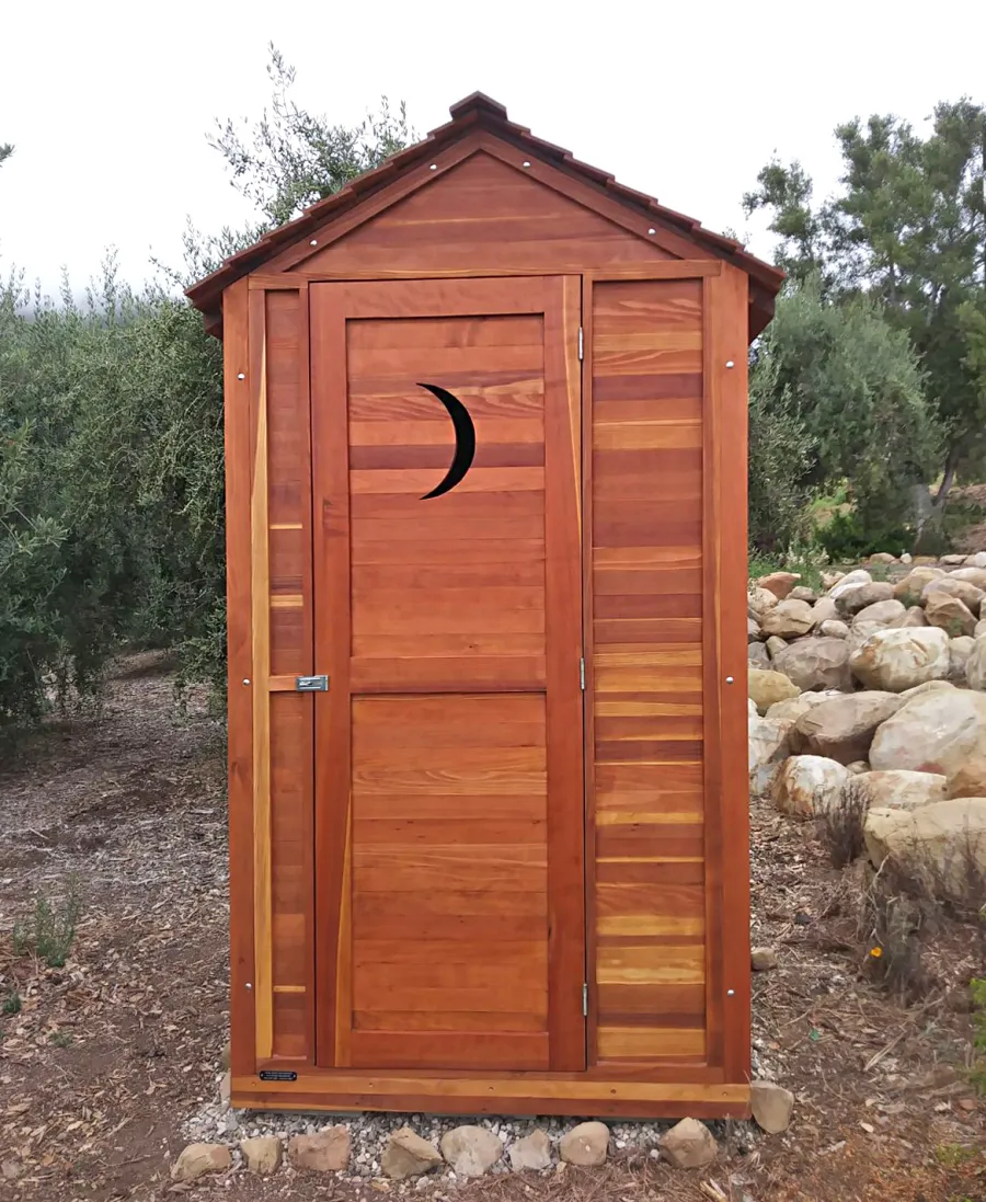 Storage Mini Barns (Options: 4.5' W, 4.5' D, 8.5' H, California Redwood, Single Door, Transparent Premium Sealant). Crescent Moon Cutout was Optional Request by Customer. Photo Courtsy of J. Massar of Carpinteria, CA.