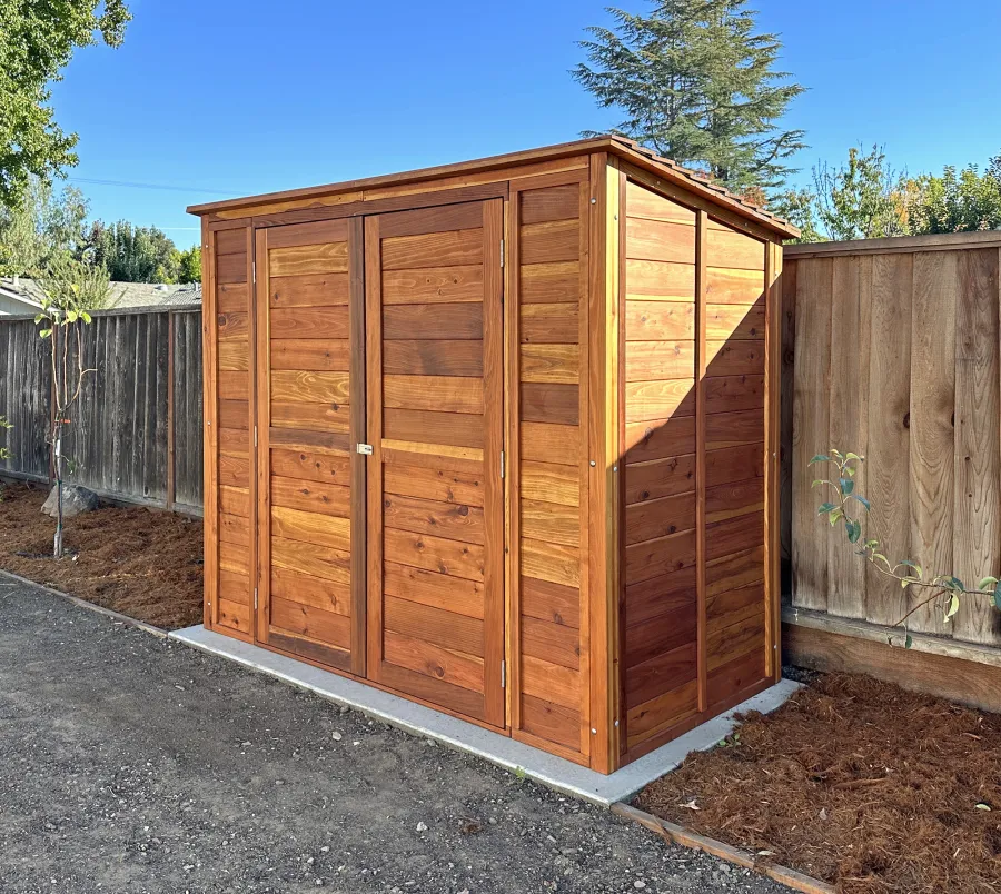 Storage Shed (Options: 8' W, 4' D, 6.5' H, California Redwood, Double Doors, Roof Inclination: From Door to Back, 1 Shelf, No Deck, Transparent Premium Sealant). Photo Courtesy of B. Payne of Los Altos, CA.