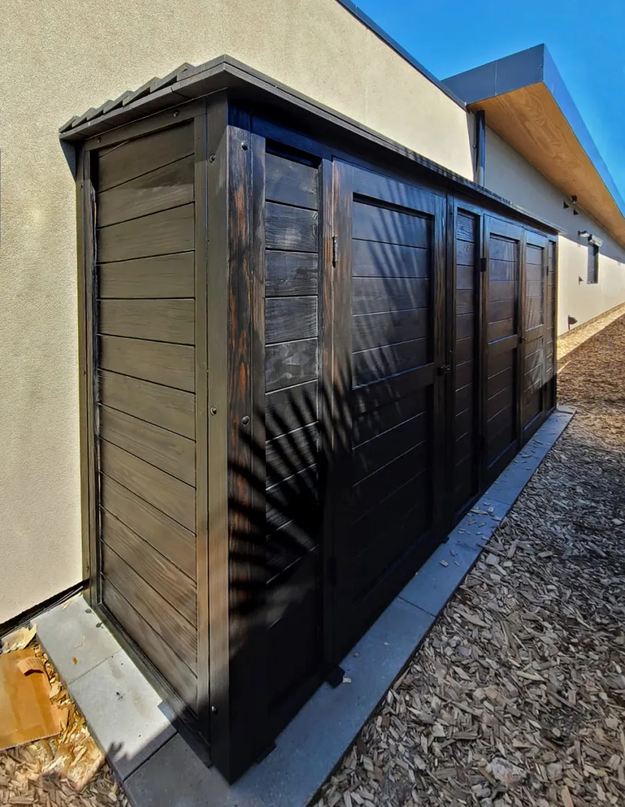 Storage Shed (Options: 12' W x 2.5' D x 7' H, Douglas-fir, Black Stain Premium Sealant). Photo Courtesy of F. Voss of Bellevue, Washington.