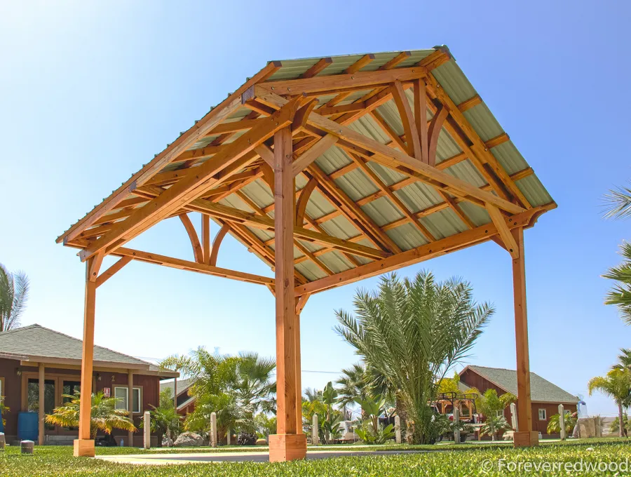 Breezy Pavilion (Options: 14' L x 12' W, Douglas-fir, 4-Post Anchor Kit for High-Wind, No Ceiling Fan Base, Vertical Decorative Trims, Transparent Premium Sealant).