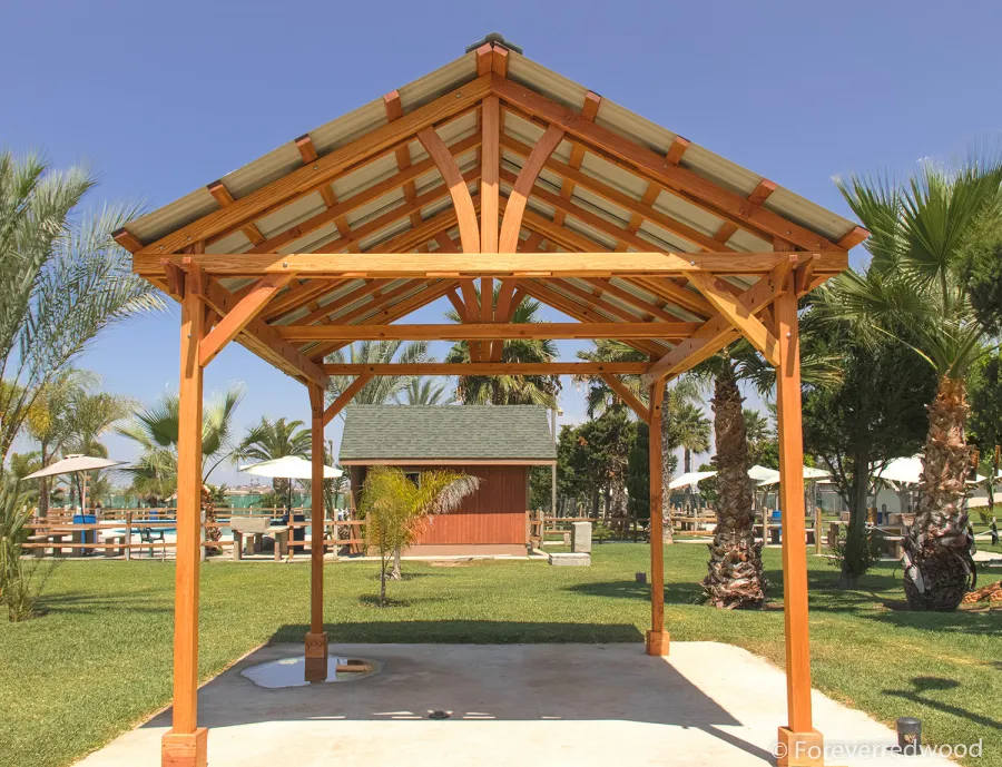 Breezy Pavilion (Options: 14' L x 12' W, Douglas-fir, 4-Post Anchor Kit for High-Wind, No Ceiling Fan Base, Vertical Decorative Trims, Transparent Premium Sealant).