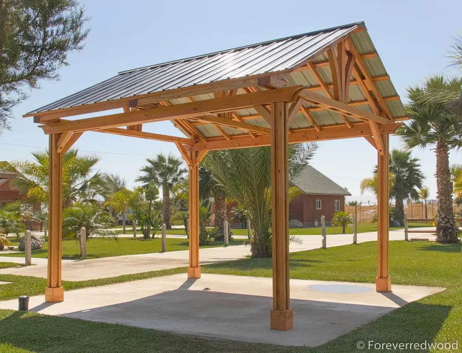 Breezy Pavilion (Options: 14' L x 12' W, Douglas-fir, 4-Post Anchor Kit for High-Wind, No Ceiling Fan Base, Vertical Decorative Trims, Transparent Premium Sealant).