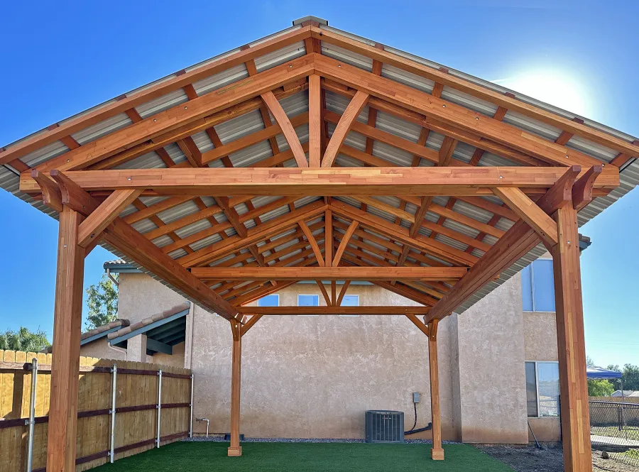 Breezy Pavilion (Options: 20' L x 15' W, Mosaic Douglas-Fir, 4-Post Anchor Kit for Concrete, No Ceiling Fan Base, No Post Decorative Trims, Transparent Premium Sealant). Photo Courtesy of B. Worley of Ramona, CA.