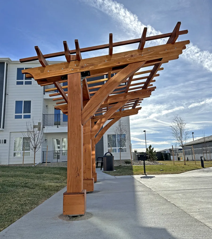 Cantilevered Pergola (Options: 8in x 8in Post Thickness, 15' Length x 8' Width, California Redwood, 7 ft Posts Height, 3-Post High-Wnd Anchor Kit, Transparent Premium Sealant). Photo Courtesy of R. Pike of Denver, CO.