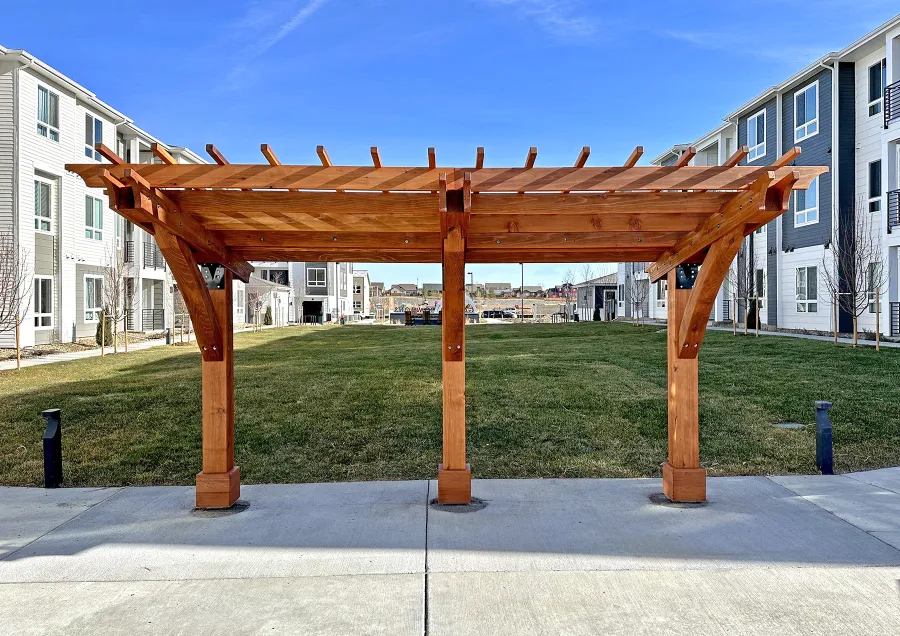Cantilevered Pergola (Options: 8in x 8in Post Thickness, 15' Length x 8' Width, California Redwood, 7 ft Posts Height, 3-Post High-Wnd Anchor Kit, Transparent Premium Sealant). Photo Courtesy of R. Pike of Denver, CO.