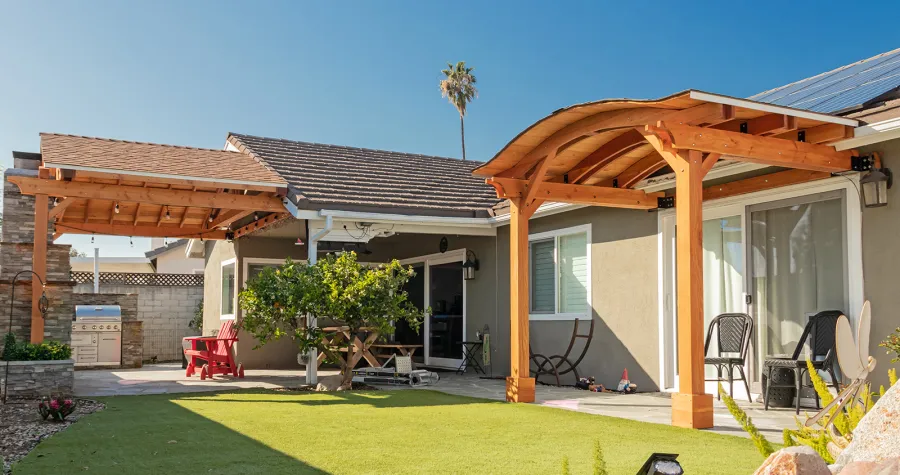 Del Norte Porch Pavilion (Options: 12' L x 16' W, Douglas-fir, 2-Post Anchor Kit for Concrete, No Ceiling Fan Base, No Electrical Wiring Trim Kit, No Post Decorative Trims, Transparent Premium Sealant). Photo also shows a Backyard Porch Pavilion. Photo Courtesy of J. Clark of San Diego, CA.