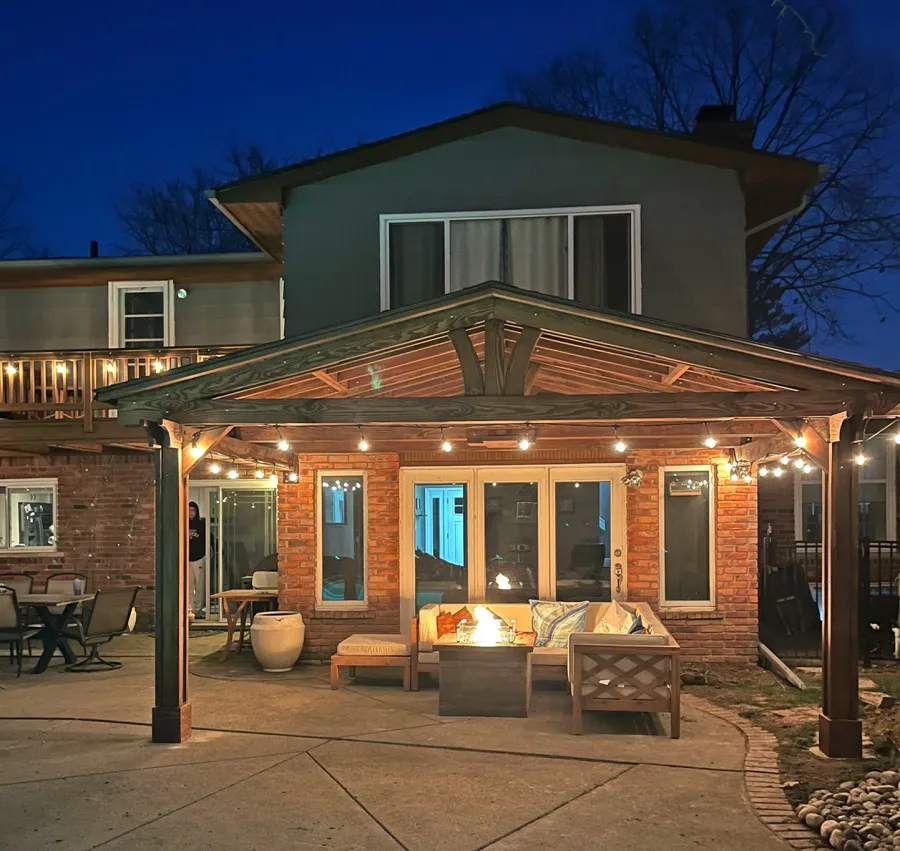 Forever Porch Pavilion (Options: 18' L x 12' W, Douglas-fir, 2-Post Anchor Kit for High-Wind, No Electrical Wiring Trim, 8.5 ft Posts Height, Vertical Post Decorative Trims, No Ceiling Fan Base, No Curtain Rods, No Privacy Panels, Transparent Premium Sealant). Photo Taken 1 Year After Installation. Photo Courtesy of C. Mellanby of West Bloomfield, Michigan.