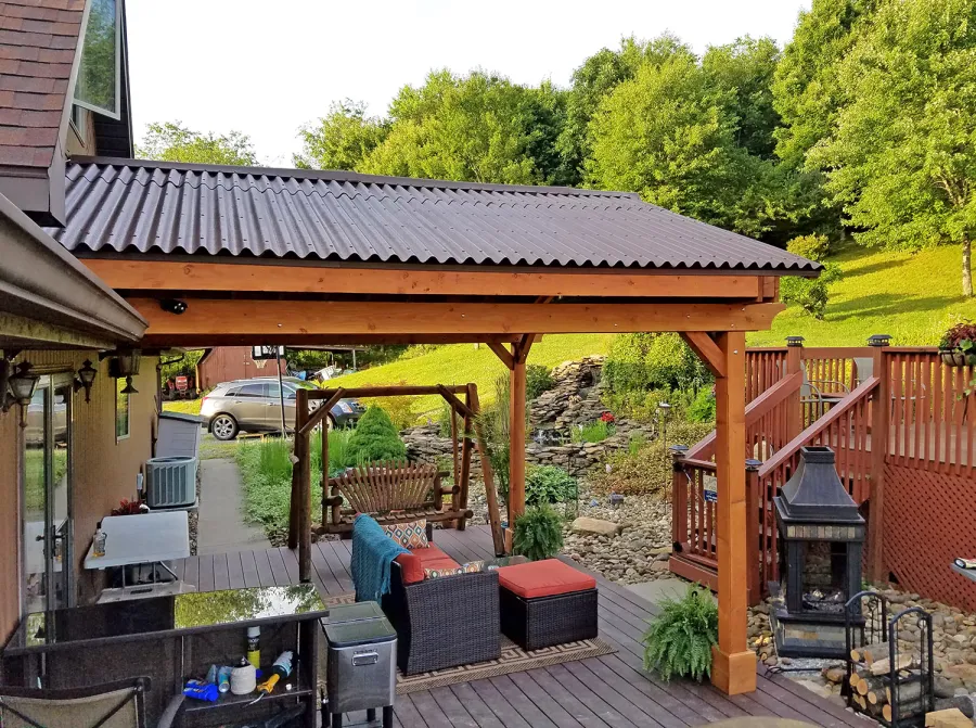 Del Norte Porch Pavilion (Options: 15'L x 15'W, Douglas-fir, 2-Post Anchor Kit for Wood, 2 Electrical Wiring Trims, 8.5 ft Posts Height, 1 Ceiling Fan Base, No Curtain Rods, No Privacy Panels, Transparent Premium Sealant). Photo Courtesy of M. McGinnis of Sarver, Pennsylvania.
