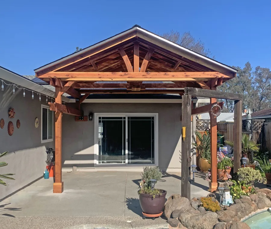 Custom Del Norte Porch Pavilion (Options: 14' L x 16' W, California Redwood, 2-Post Anchor Kit for Concrete, 10.5' H Posts, 1 Ceiling Fan Base, No Electrical Wiring Trim Kit, No Post Decorative Trims, Transparent Premium Sealant). Photo Courtesy of R. Dakin of Vacaville, CA.