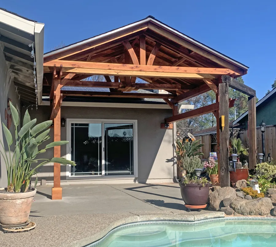 Custom Del Norte Porch Pavilion (Options: 14' L x 16' W, California Redwood, 2-Post Anchor Kit for Concrete, 10.5' H Posts, 1 Ceiling Fan Base, No Electrical Wiring Trim Kit, No Post Decorative Trims, Transparent Premium Sealant). Photo Courtesy of R. Dakin of Vacaville, CA.