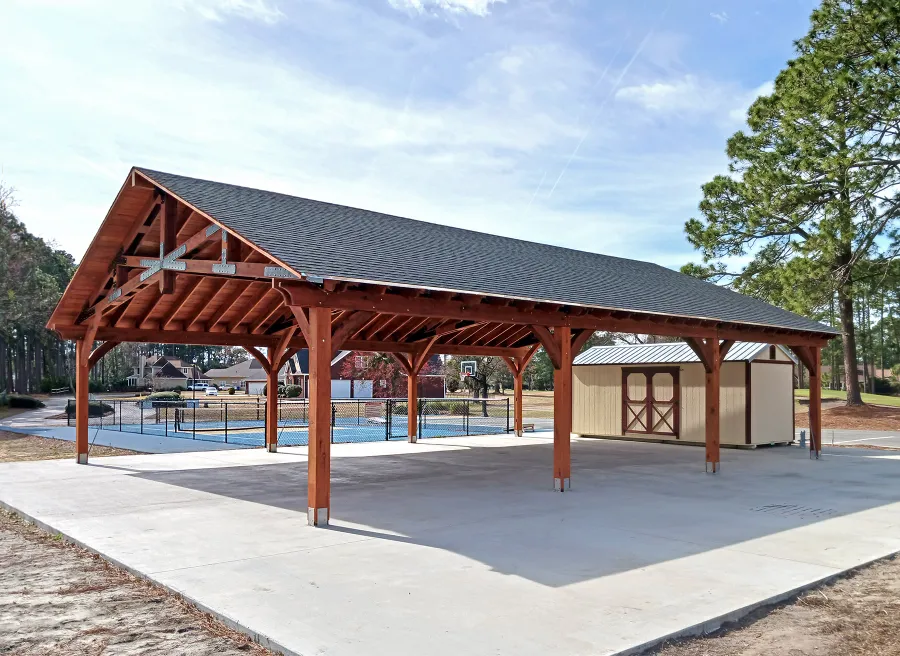 Esther Scissor Truss Pavilion (Options: 45’ L x 35’ W, California Redwood, Standard 3/4" T&G Roof Boards, 10' H Posts, with 3 Ceiling Fan Bases, 8 High-Wind Post Anchors, Transparent Premium Sealant). Photo Courtesy of F. Parini of Myrtle Beach, South Carolina.
