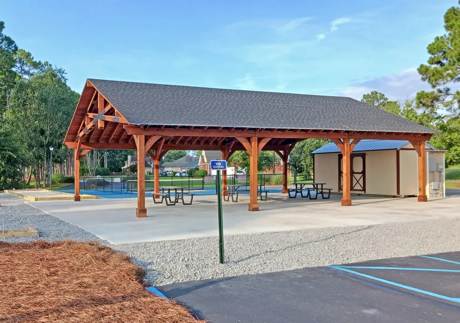 Esther Scissor Truss Pavilion (Options: 45’ L x 35’ W, California Redwood, Standard 3/4" T&G Roof Boards, 10' H Posts, with 3 Ceiling Fan Bases, 8 High-Wind Post Anchors, Transparent Premium Sealant). Photo Courtesy of F. Parini of Myrtle Beach, South Carolina.