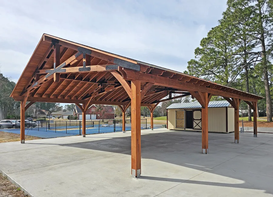 Esther Scissor Truss Pavilion (Options: 45’ L x 35’ W, California Redwood, Standard 3/4" T&G Roof Boards, 10' H Posts, with 3 Ceiling Fan Bases, 8 High-Wind Post Anchors, Transparent Premium Sealant). Photo Courtesy of F. Parini of Myrtle Beach, South Carolina.