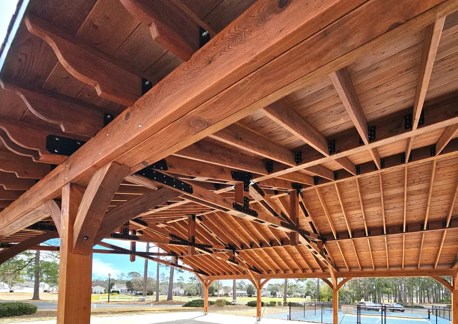 Esther Scissor Truss Pavilion (Options: 45’ L x 35’ W, California Redwood, Standard 3/4" T&G Roof Boards, 10' H Posts, with 3 Ceiling Fan Bases, 8 High-Wind Post Anchors, Transparent Premium Sealant). Photo Courtesy of F. Parini of Myrtle Beach, South Carolina.