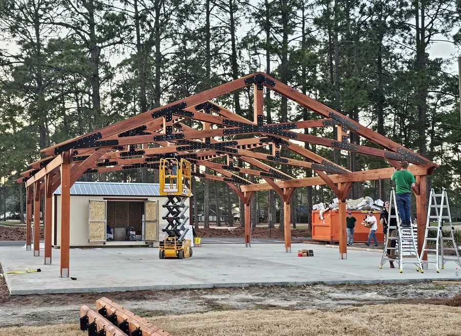 Esther Scissor Truss Pavilion (Options: 45’ L x 35’ W, California Redwood, Standard 3/4" T&G Roof Boards, 10' H Posts, with 3 Ceiling Fan Bases, 8 High-Wind Post Anchors, Transparent Premium Sealant). Photo Courtesy of F. Parini of Myrtle Beach, South Carolina.