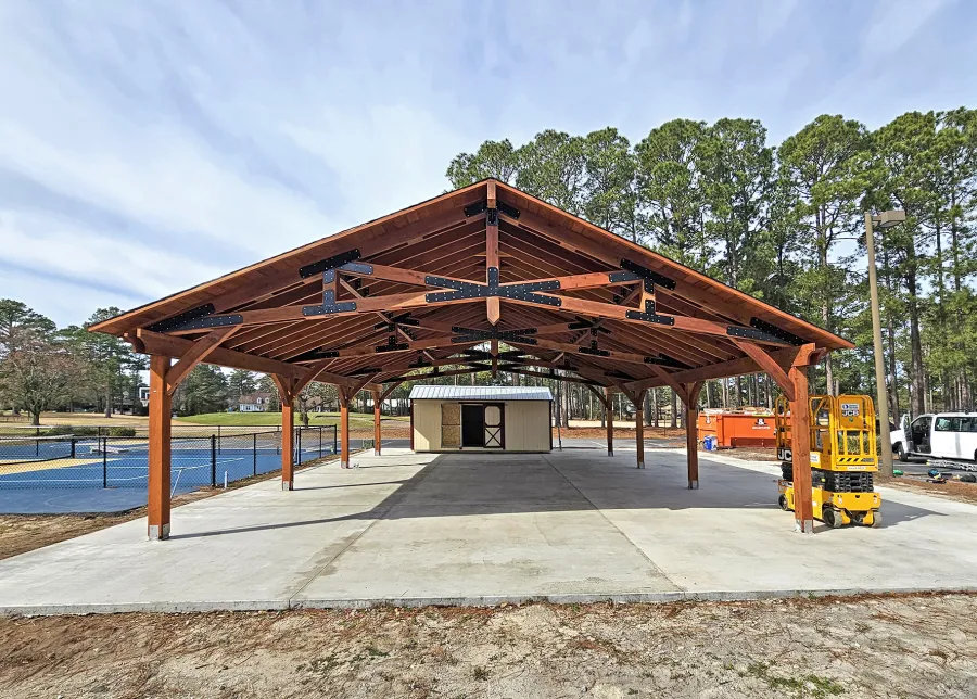 Esther Scissor Truss Pavilion (Options: 45’ L x 35’ W, California Redwood, Standard 3/4" T&G Roof Boards, 10' H Posts, with 3 Ceiling Fan Bases, 8 High-Wind Post Anchors, Transparent Premium Sealant). Photo Courtesy of F. Parini of Myrtle Beach, South Carolina.