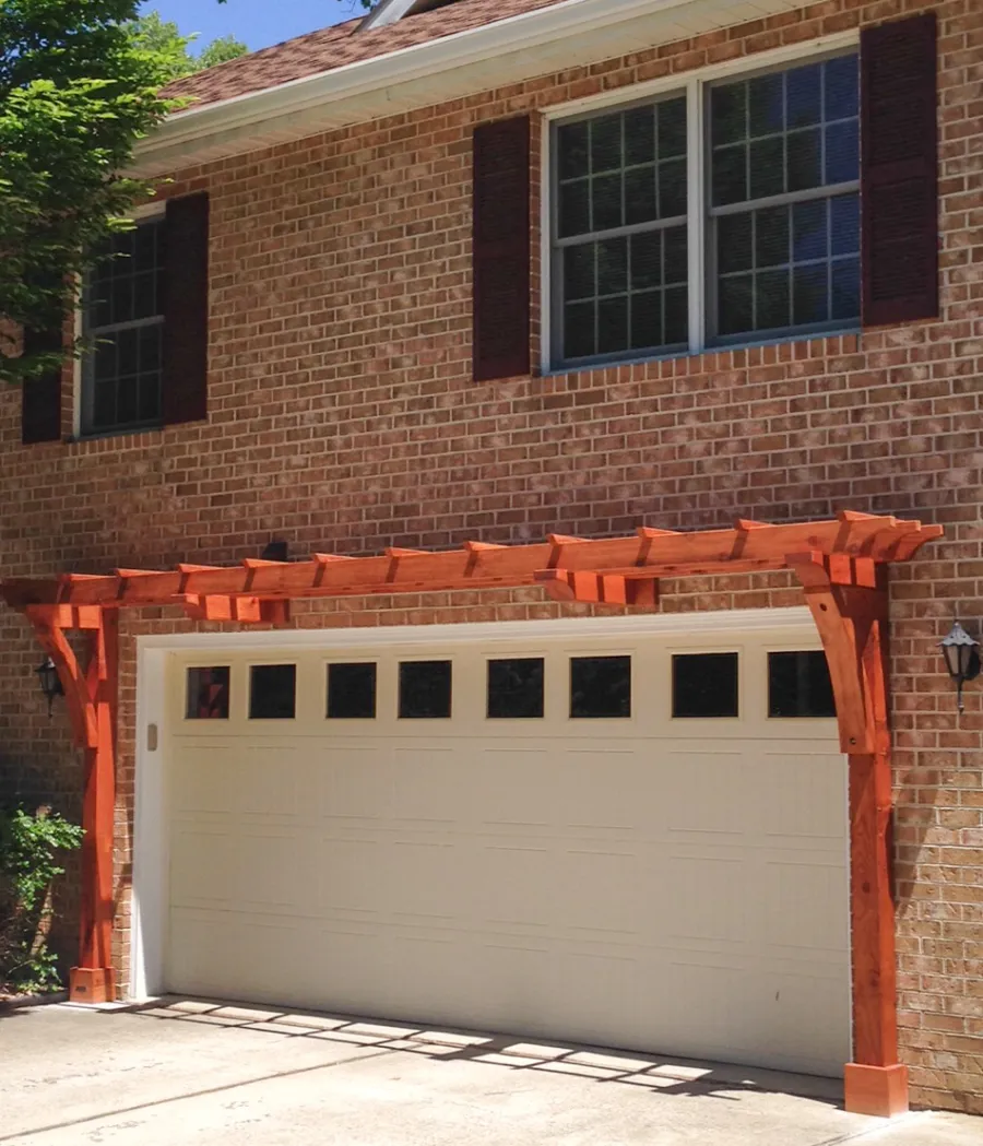 Custom Garage Arbor Kits (Options: 20' x 24", Mature Redwood, 9 ft Posts, Post Anchor Kit for High-Wind, Transparent Premium Sealant). Photo Courtesy of Josef Messmer of Fayetteville, Pennsylvania.
