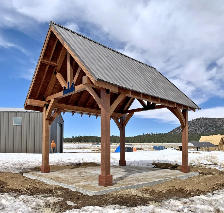 Gothic Pavilion  (Options: 18' L x 14' W, Mature Redwood, 8x8 Posts, 4-Post Anchor Kit for High-Wind, No Electrical Wiring Trims, No Fan Base, Coffee-Stain Premium Sealant). Photo Courtesy of G. Szarameta of Flagstaff, AZ.