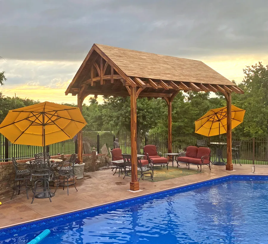 Custom Granada Pavilion Under Construction (Options: 20 ft x 15 ft, Mosaic Redwood, 4-Post Anchor Kit for High-Wind, No Fascia Board, No Curtain Rods, 3 Ceiling Fan Bases, Transparent Premium Sealant). Shake from DaVinci Roof [https://www.davinciroofscapes.com/]. Photo Courtesy of K. Lowe of Newcastle, Oklahoma.
