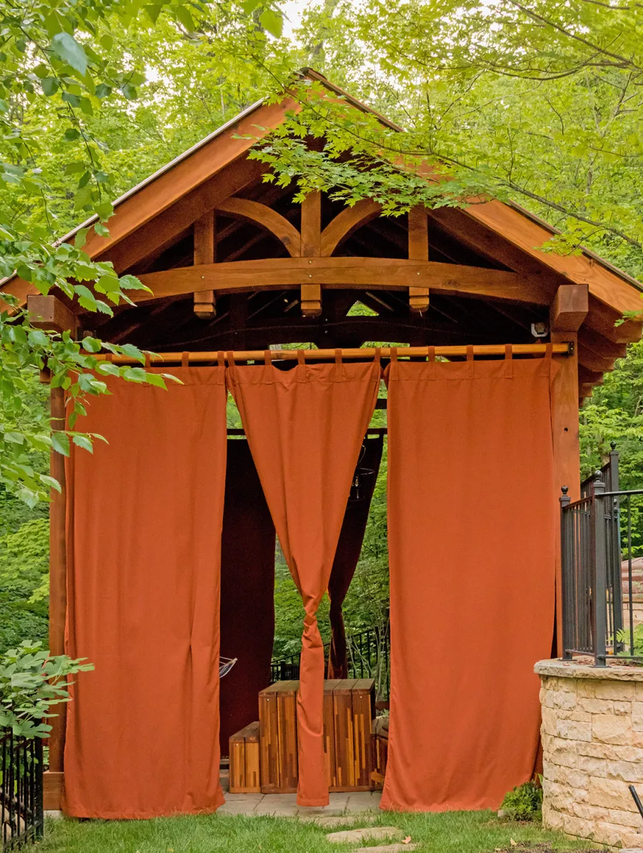 Granada Pavilion (Options: 6in x 6in post thickness, 18' L x 15' W, No Privacy Panels, California Redwood, No Fascia Board for Gutters, 10.5ft Post Height, 1 Electrical Wiring Trim, No Post Decorative Trim, 4-Post Anchor Kit for High-Wind, 3 Ceiling Fan Bases (CUSTOM REQUEST), 4 Heavy Duty Curtain Rods & Stainless Steel Hangars, Transparent Premium Sealant). Photo Courtesy of J. Rynerson of Franklin, Tennessee.