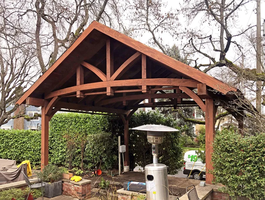Granada Pavilion (Options: 8in x 8in post thickness, 21' L x 24'-7" W, No Privacy Panels, California Redwood, No Fascia Board for Gutters, 10 ft Post Height, 1 Electrical Wiring Trim, No Post Decorative Trim, 4-Post Anchor Kit for High-Wind, 1 Ceiling Fan Base, 4 Curtain Rods, Coffee-Stain Premium Sealant). Photo Courtesy of T. Hatfield of Portland, Oregon.