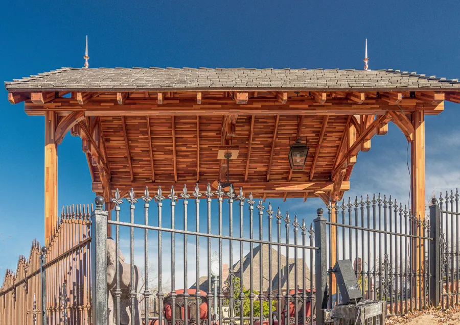 Custom Granada Pavilion (Options: 20 ft x 15 ft, Mosaic Redwood, 4-Post Anchor Kit for High-Wind, No Fascia Board, No Curtain Rods, 3 Ceiling Fan Bases, Transparent Premium Sealant). Shake from DaVinci Roof [https://www.davinciroofscapes.com/]. Photo Courtesy of K. Lowe of Newcastle, Oklahoma.