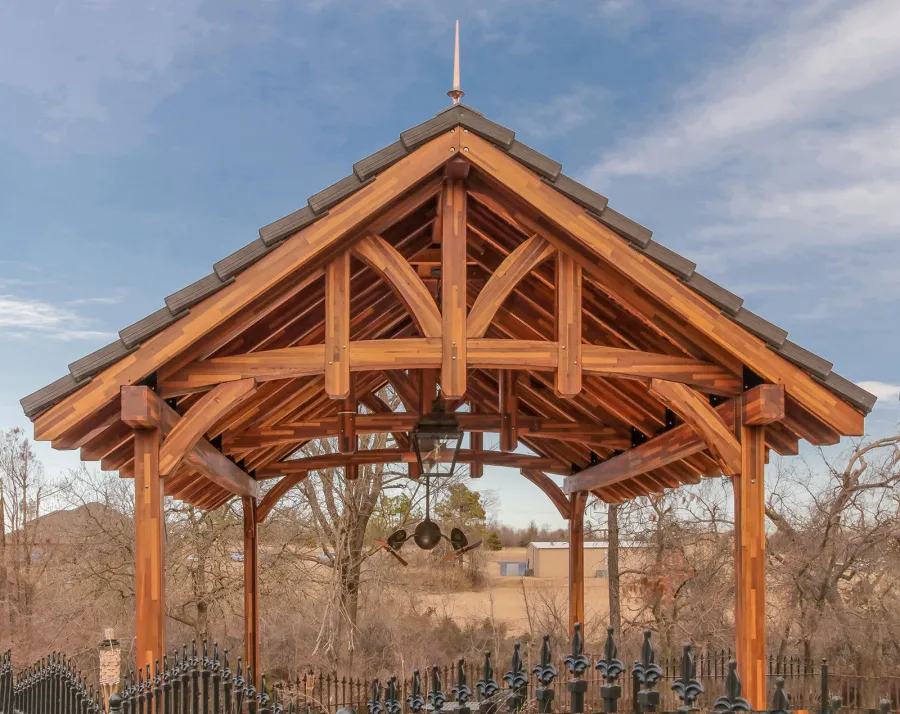 Custom Granada Pavilion (Options: 20 ft x 15 ft, Mosaic Redwood, 4-Post Anchor Kit for High-Wind, No Fascia Board, No Curtain Rods, 3 Ceiling Fan Bases, Transparent Premium Sealant). Shake from DaVinci Roof [https://www.davinciroofscapes.com/]. Photo Courtesy of K. Lowe of Newcastle, Oklahoma.