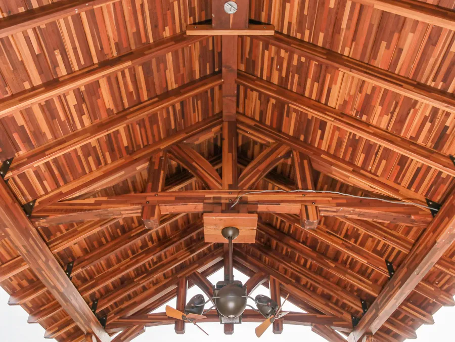 Custom Granada Pavilion (Options: 20 ft x 15 ft, Mosaic Redwood, 4-Post Anchor Kit for High-Wind, No Fascia Board, No Curtain Rods, 3 Ceiling Fan Bases, Transparent Premium Sealant). Shake from DaVinci Roof [https://www.davinciroofscapes.com/]. Photo Courtesy of K. Lowe of Newcastle, Oklahoma.