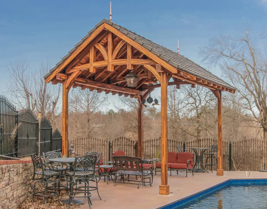 Custom Granada Pavilion (Options: 20 ft x 15 ft, Mosaic Redwood, 4-Post Anchor Kit for High-Wind, No Fascia Board, No Curtain Rods, 3 Ceiling Fan Bases, Transparent Premium Sealant). Shake from DaVinci Roof [https://www.davinciroofscapes.com/]. Photo Courtesy of K. Lowe of Newcastle, Oklahoma.
