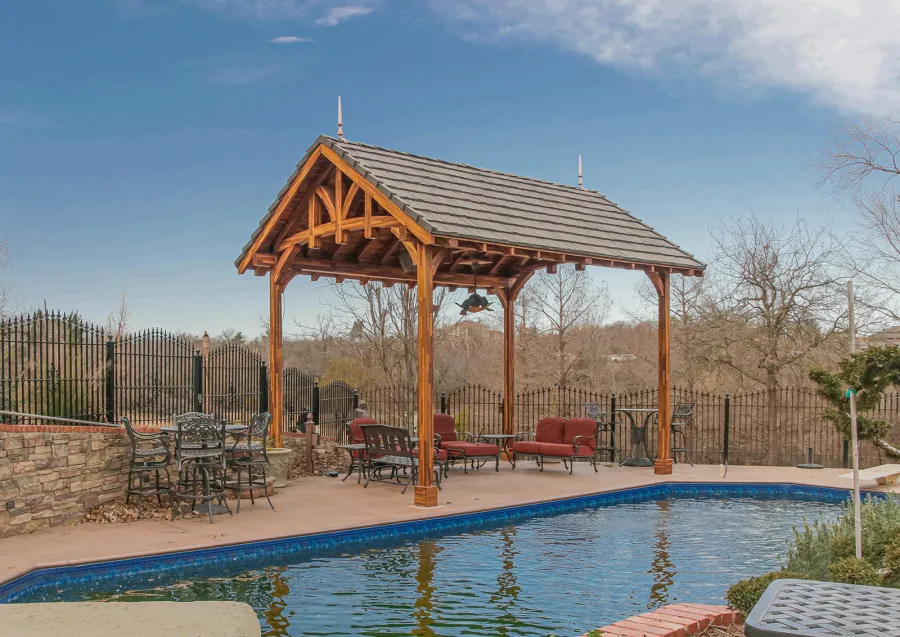 Custom Granada Pavilion (Options: 20 ft x 15 ft, Mosaic Redwood, 4-Post Anchor Kit for High-Wind, No Fascia Board, No Curtain Rods, 3 Ceiling Fan Bases, Transparent Premium Sealant). Shake from DaVinci Roof [https://www.davinciroofscapes.com/]. Photo Courtesy of K. Lowe of Newcastle, Oklahoma.