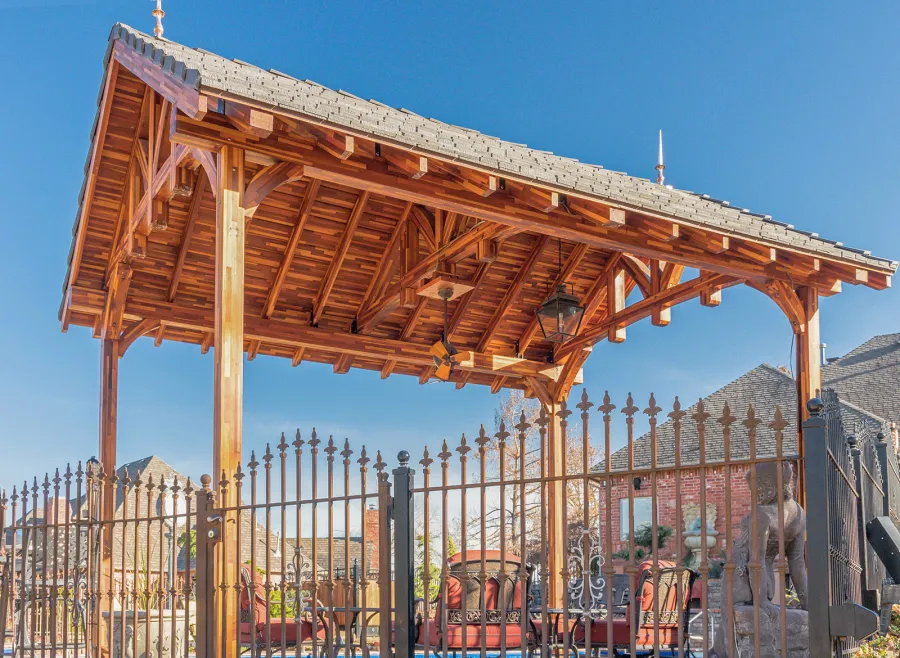Custom Granada Pavilion (Options: 20 ft x 15 ft, Mosaic Redwood, 4-Post Anchor Kit for High-Wind, No Fascia Board, No Curtain Rods, 3 Ceiling Fan Bases, Transparent Premium Sealant). Shake from DaVinci Roof [https://www.davinciroofscapes.com/]. Photo Courtesy of K. Lowe of Newcastle, Oklahoma.