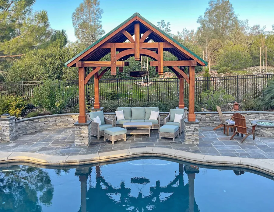 Custom Granada Pavilion (Options: 12’ L x 16’ W, California Redwood, 4-Post Anchor Kit for High Wind, Electrical Wiring Trim Kit for 1 Post, 1 Ceiling Fan Base, Transparent Premium Sealant), Photo Courtesy of S. Moore of Shingle Springs, California.