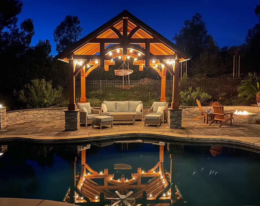 Custom Granada Pavilion (Options: 12’ L x 16’ W, California Redwood, 4-Post Anchor Kit for High Wind, Electrical Wiring Trim Kit for 1 Post, 1 Ceiling Fan Base, Transparent Premium Sealant), Photo Courtesy of S. Moore of Shingle Springs, California.