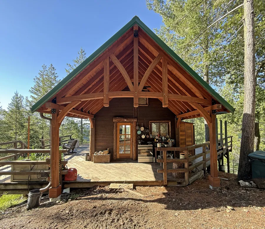 Custom Attached Granada Pavilion (Options: 10’ L x 18’ W, Mosaic Redwood, Increased Roof Pitch by Custom Request, Post Anchor Kit for High Wind, No Electrical Wiring Trim Kit, No Ceiling Fan Base, Coffee-Stain Premium Sealant).