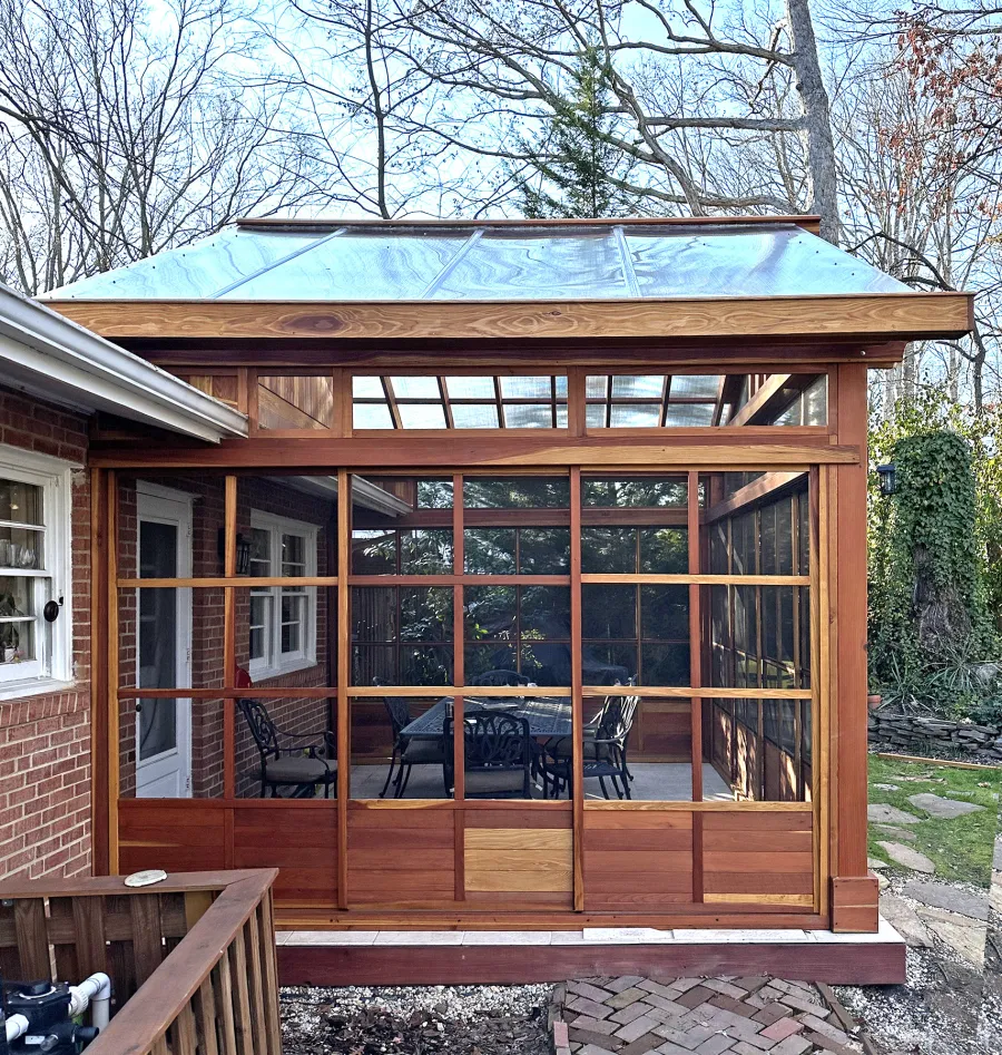 Custom Illuminati Pavilion (Options: 13’-4’’ L x 18’-6’’ W, California Redwood, Enclosed by Custom Request, 11’ Post Height, Standard Post Anchor Kit, 1 Ceiling Fan base, Wooden Cover for Gutter, Transparent Premium Sealant). Photo Courtesy of P. Morris of Seven Corners, VA.