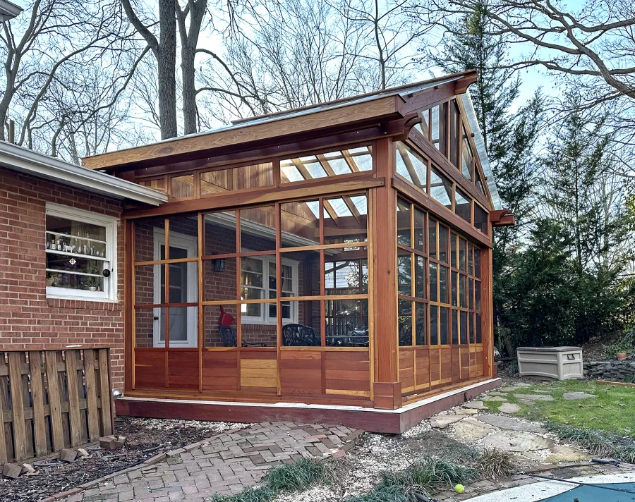 Custom Illuminati Pavilion (Options: 13’-4’’ L x 18’-6’’ W, California Redwood, Enclosed by Custom Request, 11’ Post Height, Standard Post Anchor Kit, 1 Ceiling Fan base, Wooden Cover for Gutter, Transparent Premium Sealant). Photo Courtesy of P. Morris of Seven Corners, VA.