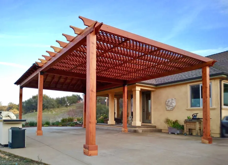 Lattice Pergola Kit & Loreto Pavilion (Options: 16' L x 20' W, Attached to a 20' x 20' Loreto Pavilion, California Redwood, No Electrical Wiring Trim, Widthwise Roof Support Timbers, 6-Post Anchor Kit for High-Wind, No Ceiling Fan Base, No Privacy Panels, No Curtain Rods, 9.5' Post Height, Transparent Premium Sealant). Photo Courtesy of R. Offenbach of Ione, CA.
